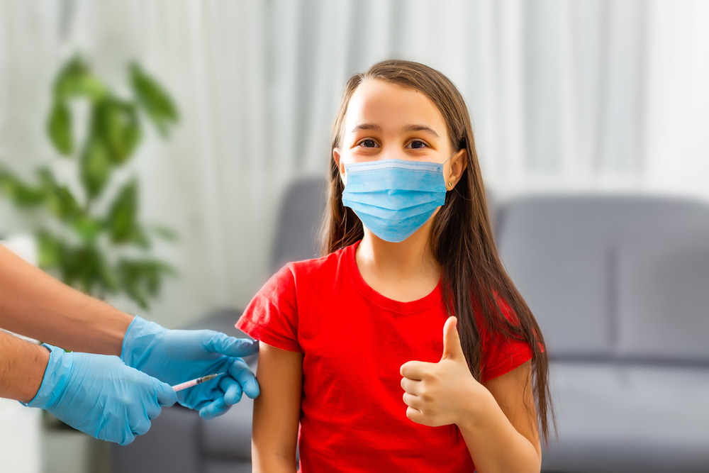 Little,Girl,Receiving,Vaccination,In,Clinic,,Closeup.,Virus,Prevention