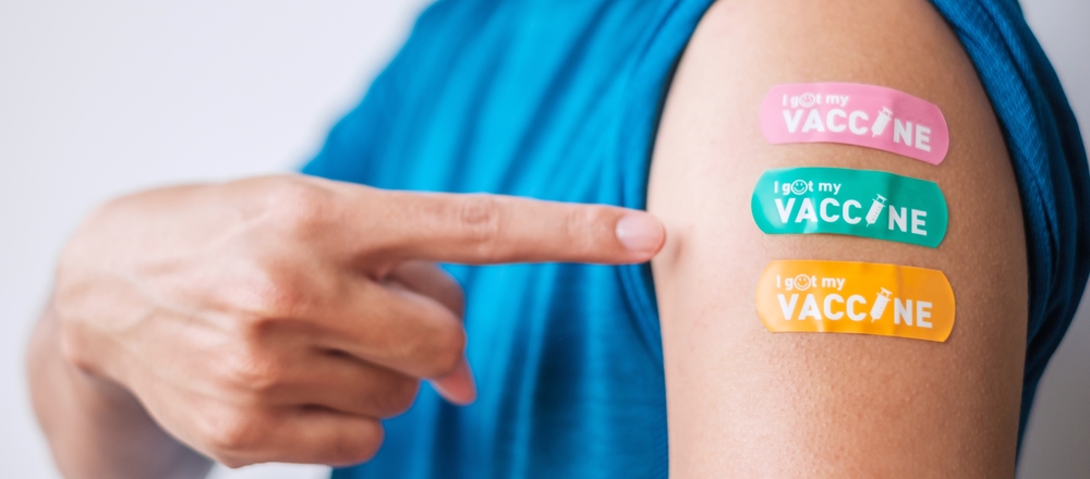 Man,Showing,Bandage,After,Receiving,Covid,19,Vaccine.,Vaccination,,Herd