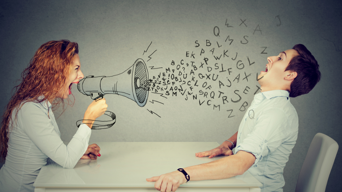angry young woman with megaphone shouting at stressed scared man blown away by wave of alphabet letters