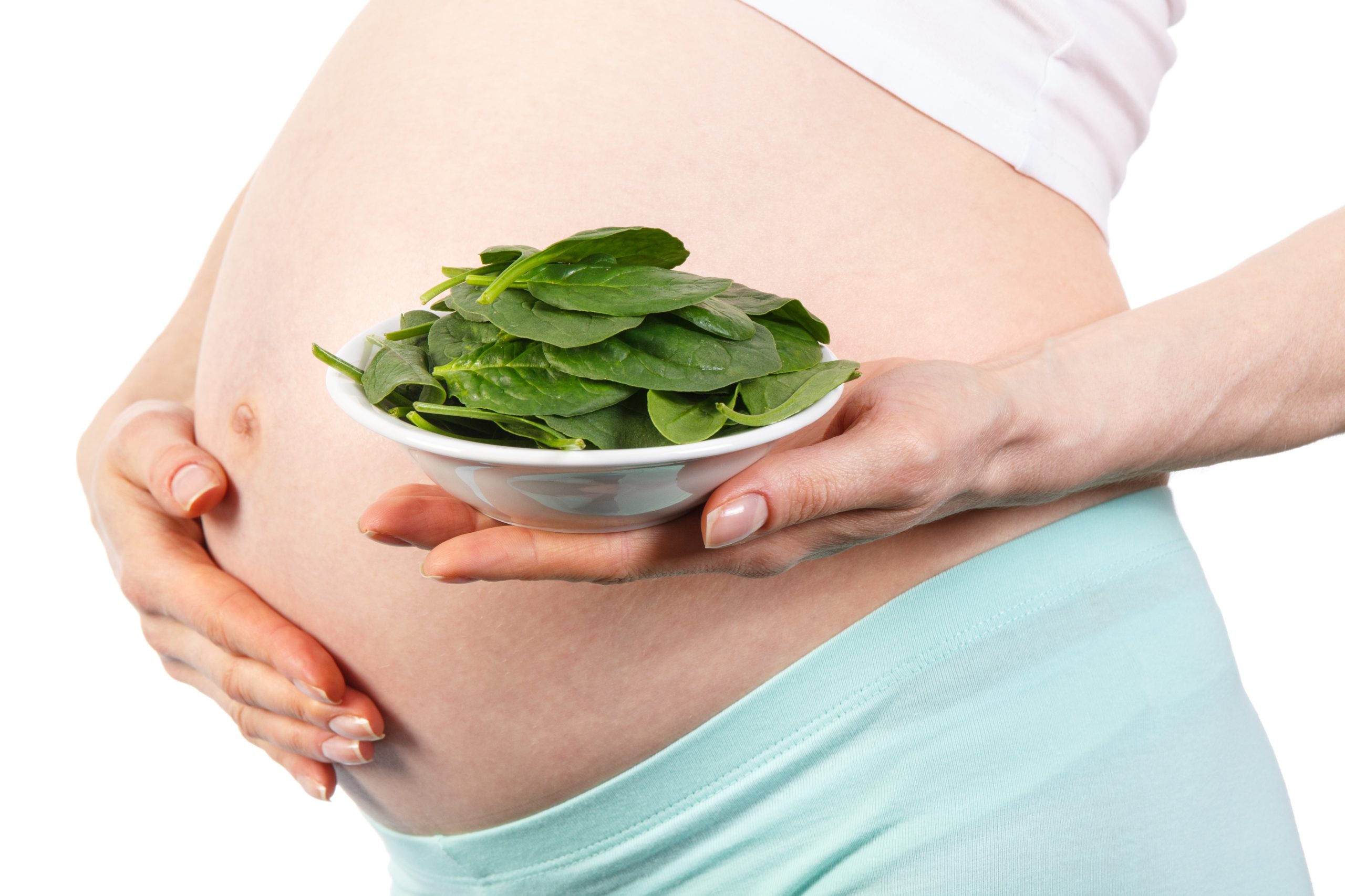 Pregnant,Woman,With,Portion,Of,Fresh,Green,Spinach,,Concept,Of