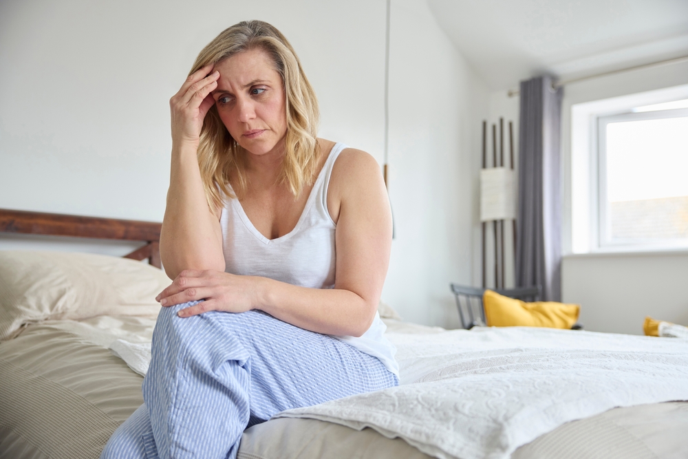 Menopausal,Mature,Woman,Suffering,With,Low,Mood,And,Anxiety,Sitting