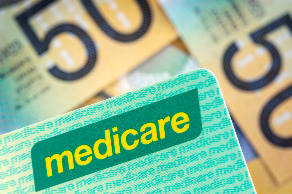 Australian,Medicare,Card,Over,Blurred,Money,Background.