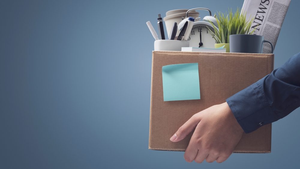 Office,Worker,Carrying,Personal,Belongings,In,A,Box,After,Being