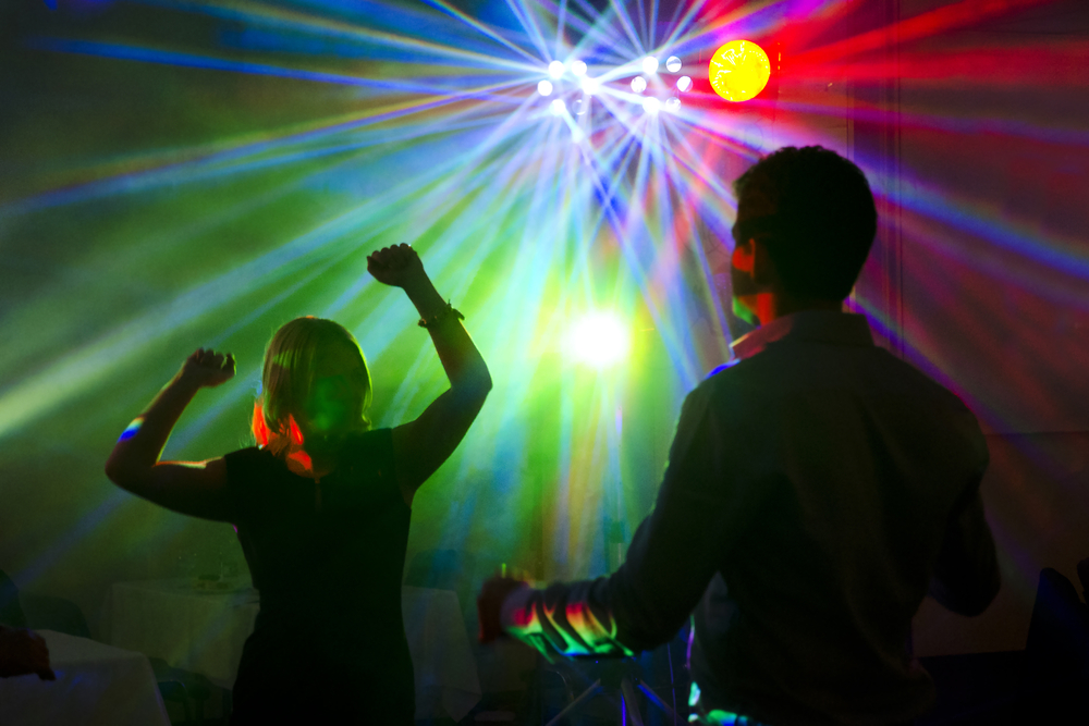 Man,An,Woman,Dancing,Together,On,Party,-,Night,Club