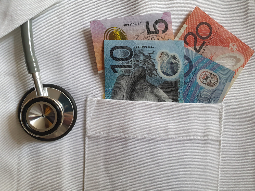 Australian,Money,In,The,Bag,Of,A,White,Fabric,Gown