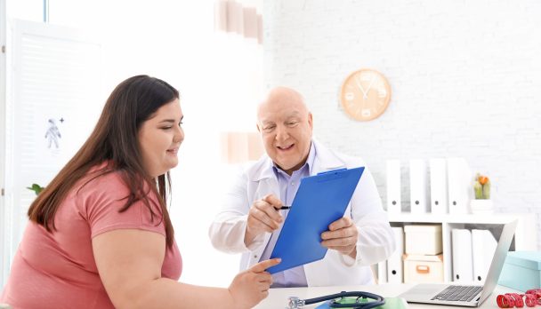Overweight,Woman,Having,Consultation,At,Doctor's,Office