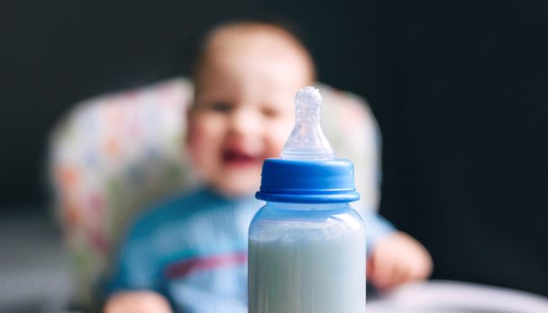 Happy,Boy,Of,10,Months,Drinking,Milk,From,A,Bottle