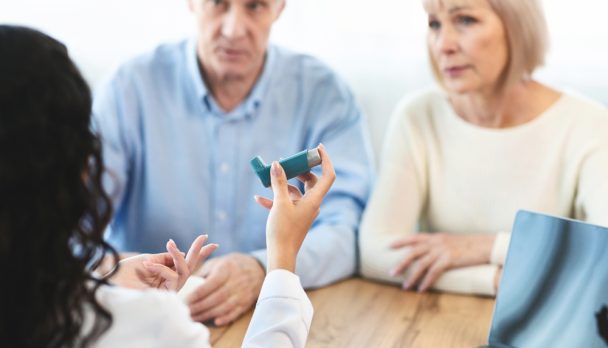 Doctor,Holding,Blue,Asthma,Inhaler,For,Treatment,Copd,Diseases,For