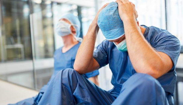 Two,Exhausted,And,Desperate,Surgeons,As,Signs,Of,Congestion,And