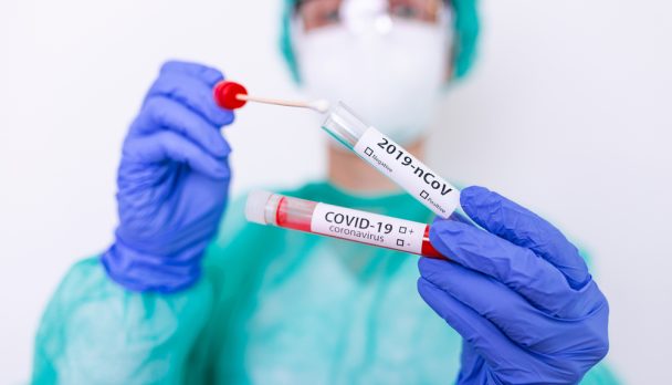 Covid-19,Nasal,Swab,Laboratory,Test,In,Hospital,Lab,,Nurse,Holding