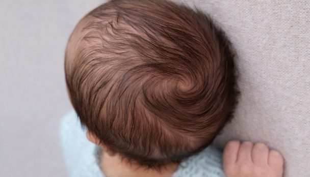 Crown.,Head,Of,The,Newborn,Baby,First,Hear,,Close,Up,