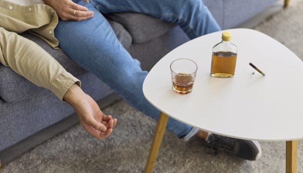Alcohol,Addiction,Man,With,Whiskey,And,Cigarette.,On,A,Sofa,