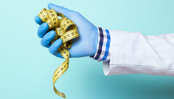 Obesity,,Fat,Kills,You,Slowly.,The,Doctor,Is,Holding,A