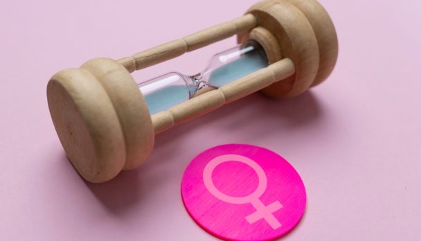 A,Wooden,Hourglass,With,The,Female,Gender,Symbol.,Women's,Health,